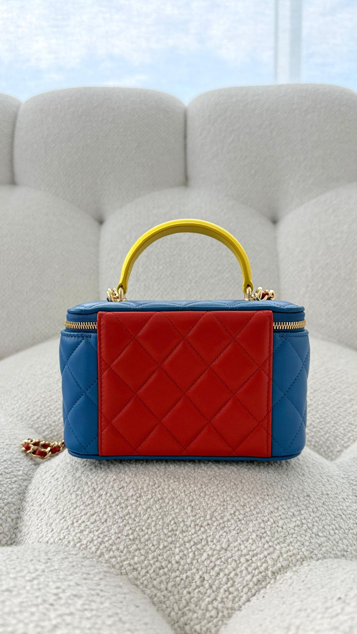 Chanel Metiers d’Art 2026 Long Vanity with Chain Calfskin, Enamel & Gold-Tone Metal Blue, Yellow & Red